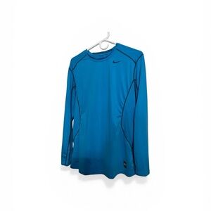 Nike Pro Combat size Medium blue long sleeve fitted dri-fit. Gently worn